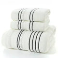 Pure cotton bath towel set showing large bath towel and two matching hand towels in available colours