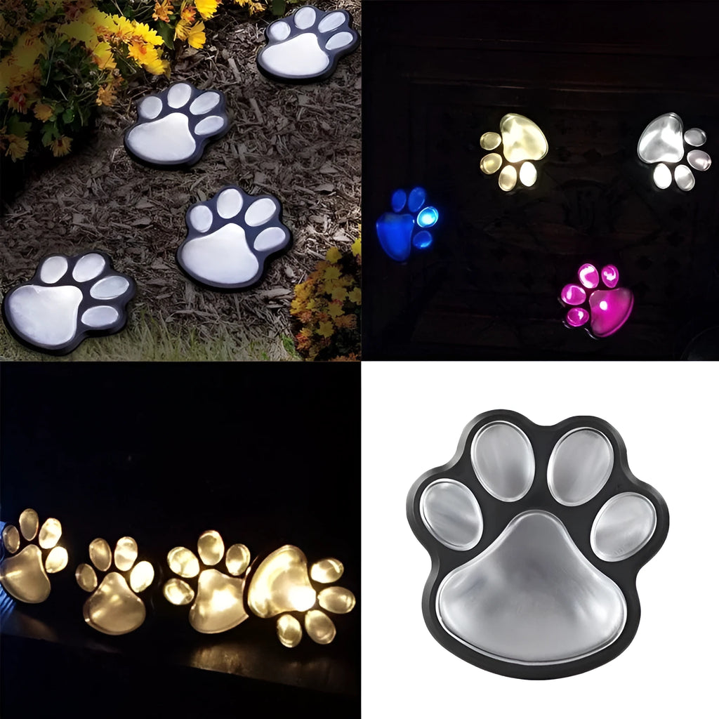Four black solar-powered bear paw print garden lights with solar panel pole