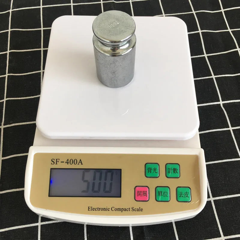 SF-400A electronic kitchen scale with digital display, 10kg capacity, and battery compartment for AA batteries