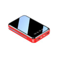 White mini power bank with digital display showing battery percentage, measuring 94x63x24mm