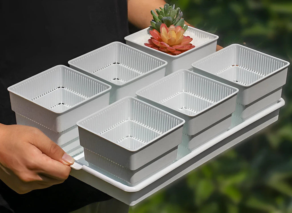 Meishi black and white resin succulent flower pot with drainage tray, shown in various style configurations.