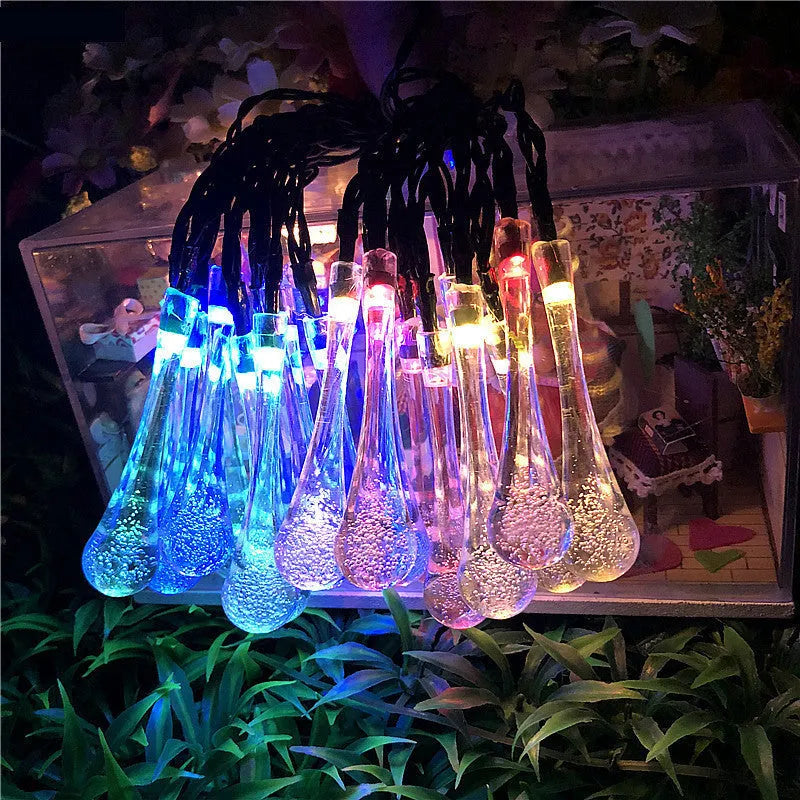 Solar-powered LED outdoor string lights with water drop pendants on 6.5 metre cable