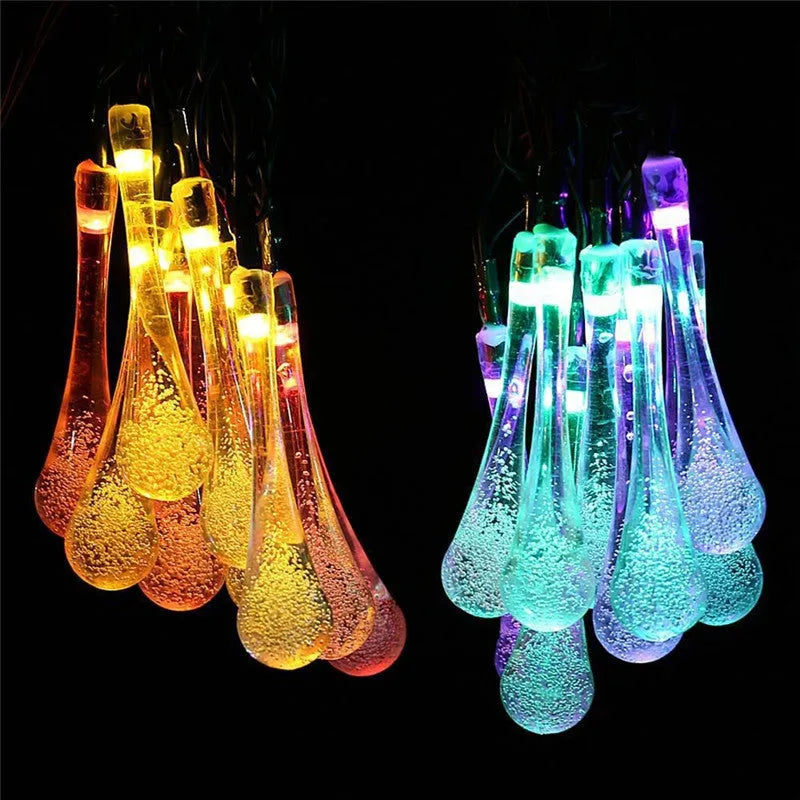 Solar-powered LED outdoor string lights with water drop pendants on 6.5 metre cable