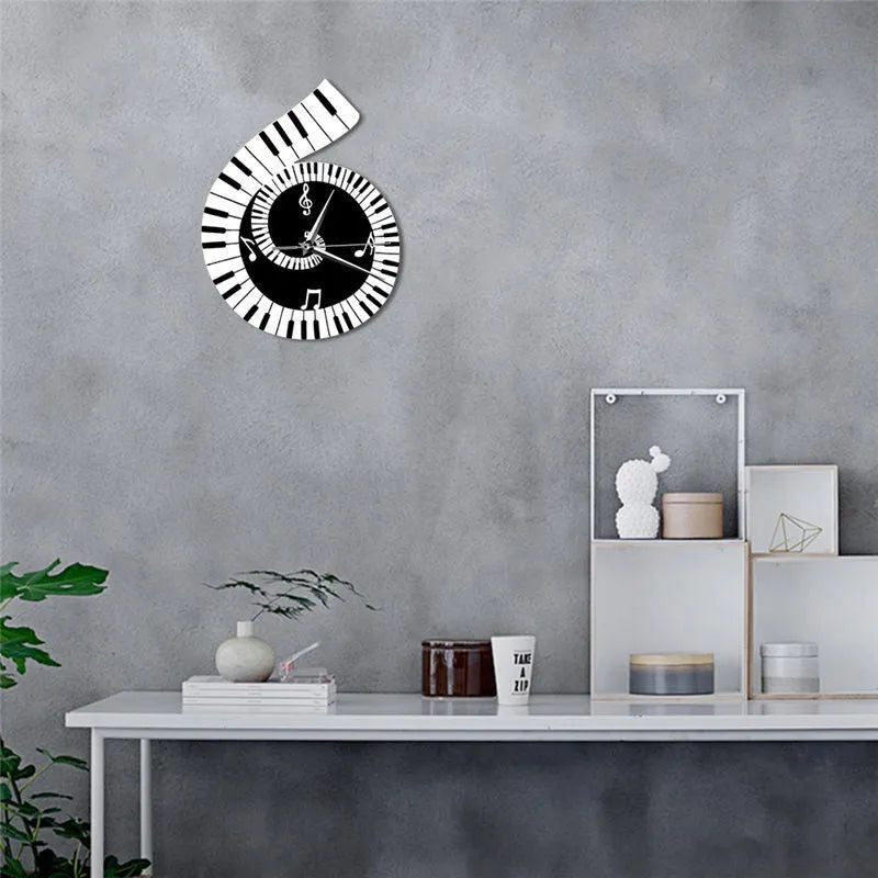 Black and white irregular shape wall clock decorated with treble clef symbol and piano keyboard graphic