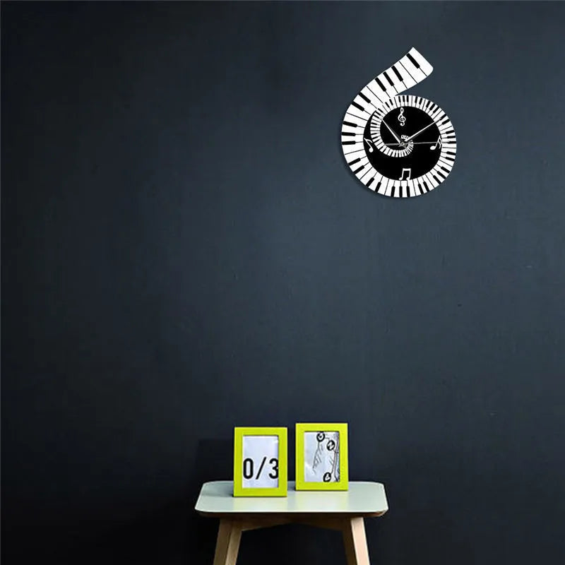 Black and white irregular shape wall clock decorated with treble clef symbol and piano keyboard graphic