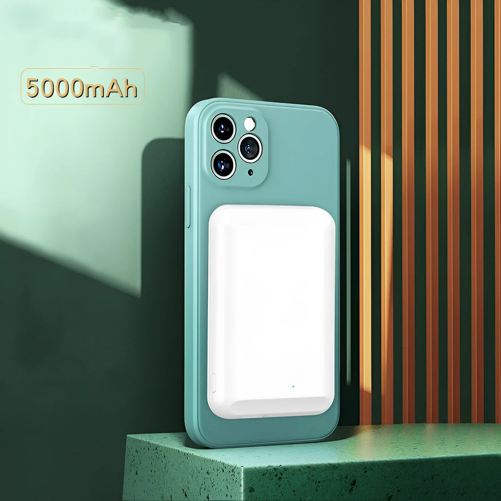 A black magnetic wireless power bank attached to the back of a mobile phone.