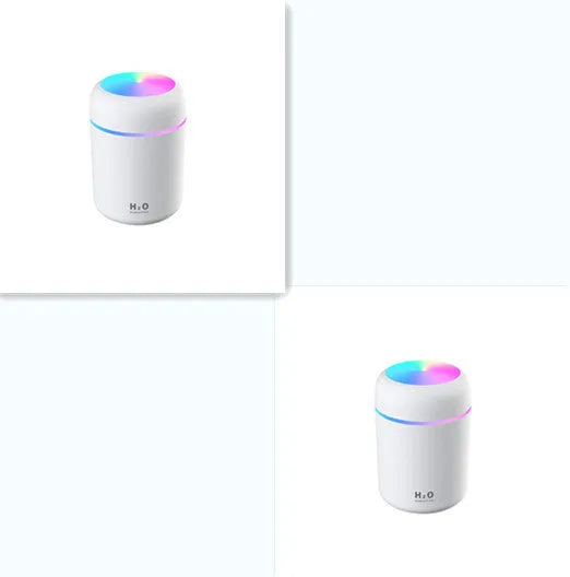 Pink car USB humidifier with LED lights showing water tank and control button