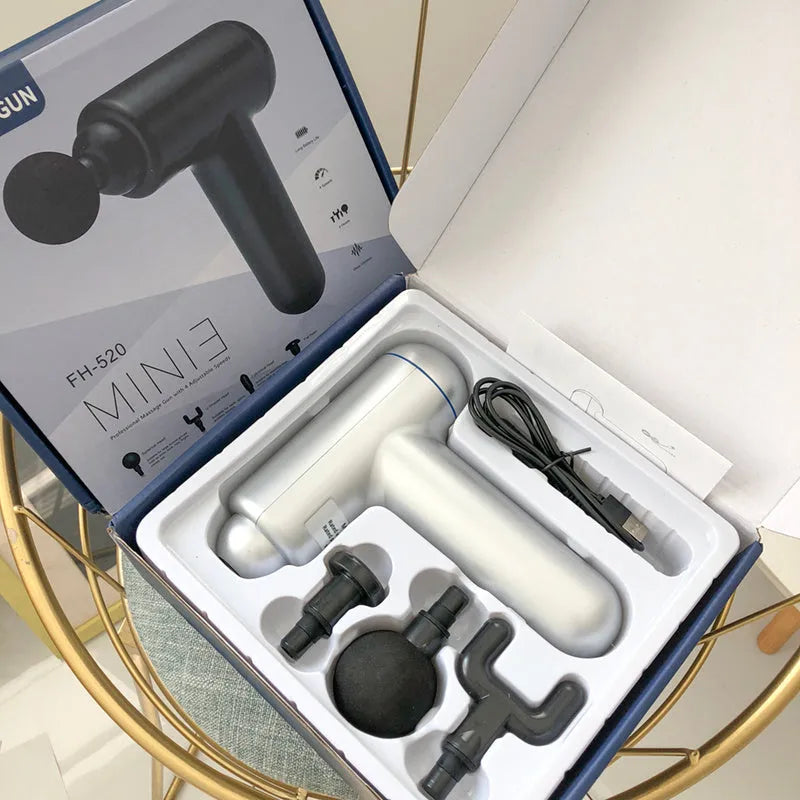 Fascia gun muscle massager in black, red, or white with USB charging port