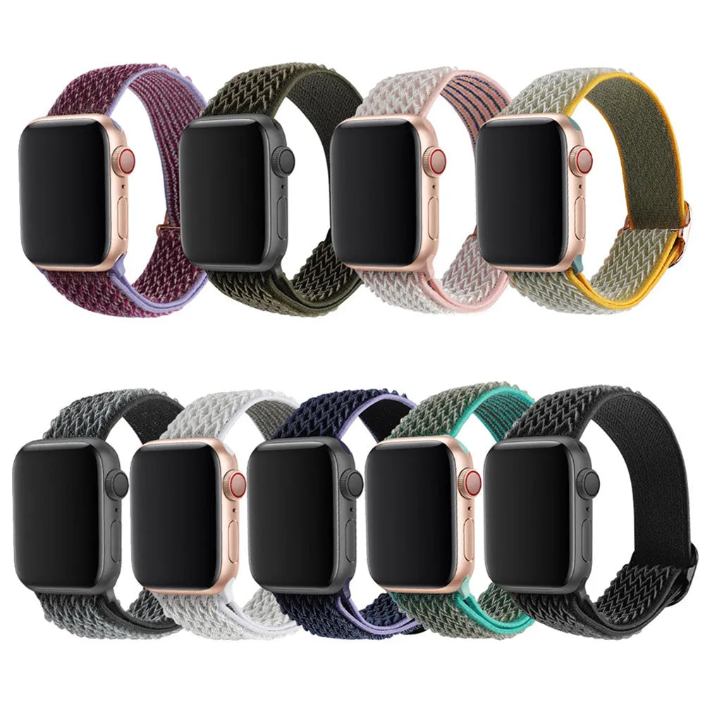 Braided nylon elastic Apple Watch strap with a grey wave pattern, shown detached from a watch.