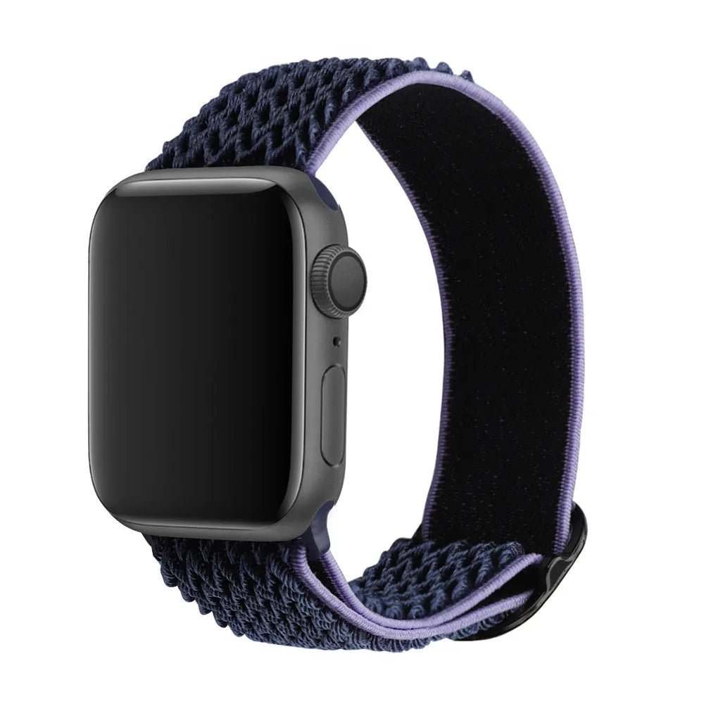 Braided nylon elastic Apple Watch strap with a grey wave pattern, shown detached from a watch.