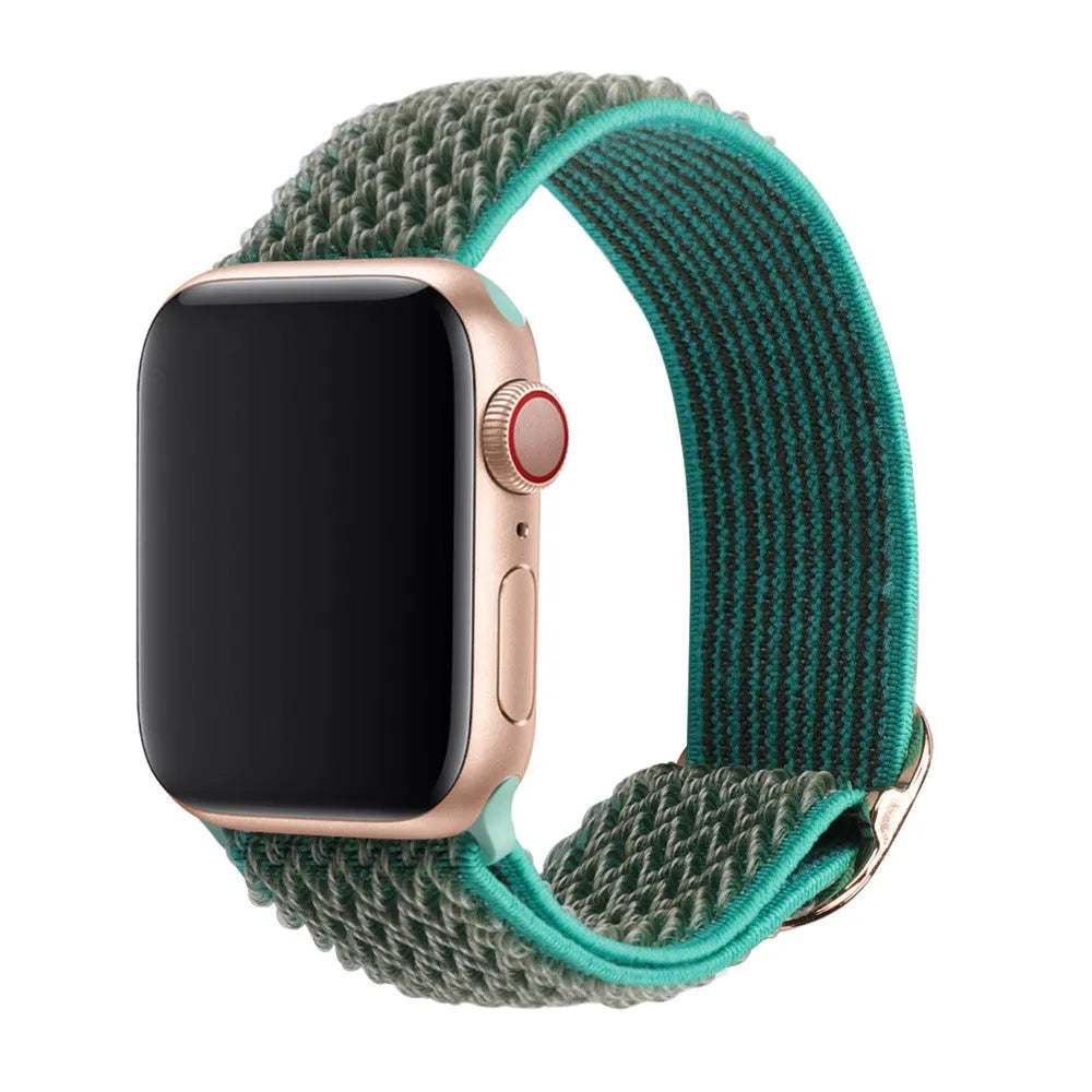 Braided nylon elastic Apple Watch strap with a grey wave pattern, shown detached from a watch.