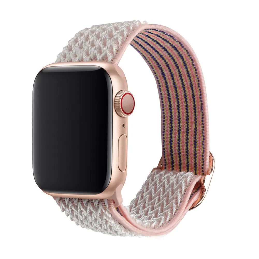 Braided nylon elastic Apple Watch strap with a grey wave pattern, shown detached from a watch.