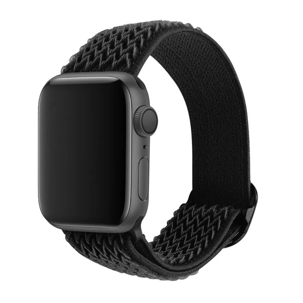 Braided nylon elastic Apple Watch strap with a grey wave pattern, shown detached from a watch.