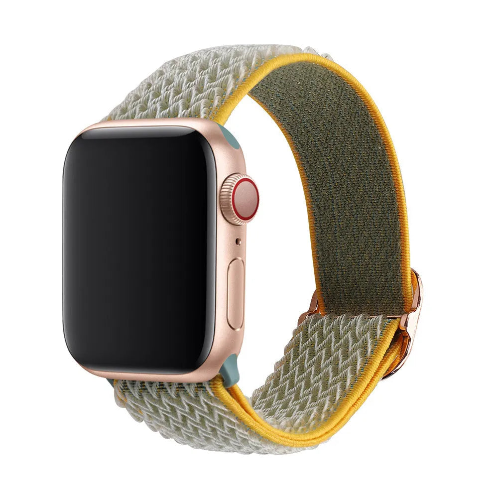 Braided nylon elastic Apple Watch strap with a grey wave pattern, shown detached from a watch.