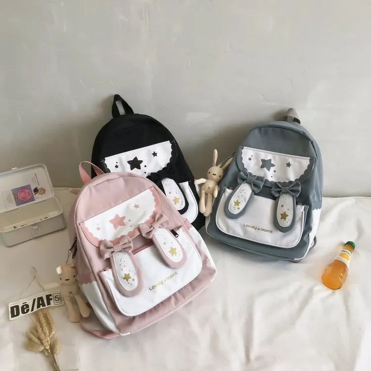Cute bunny ears bowknot backpack in black with vertical square shape and soft handle