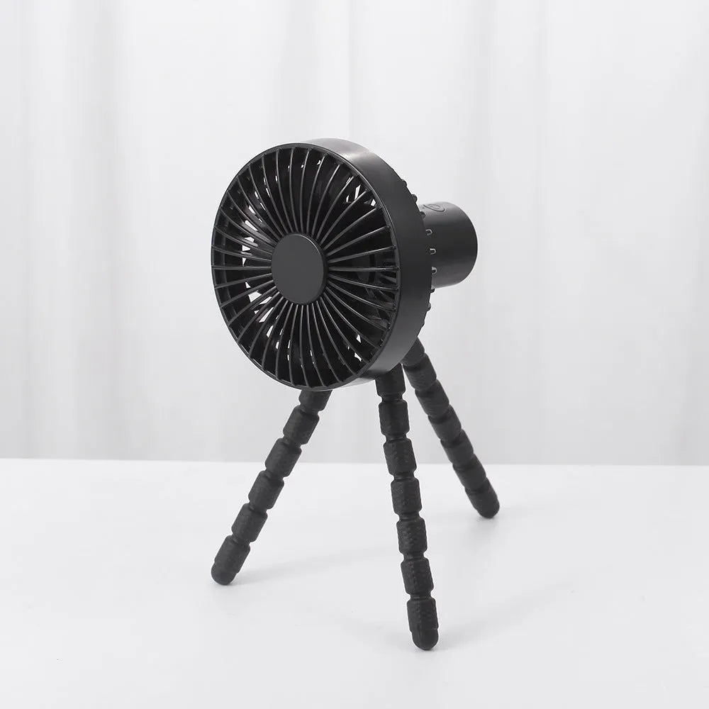 Small adjustable desktop fan with bending head on an octopus tripod, shown in black, green, pink, or white.