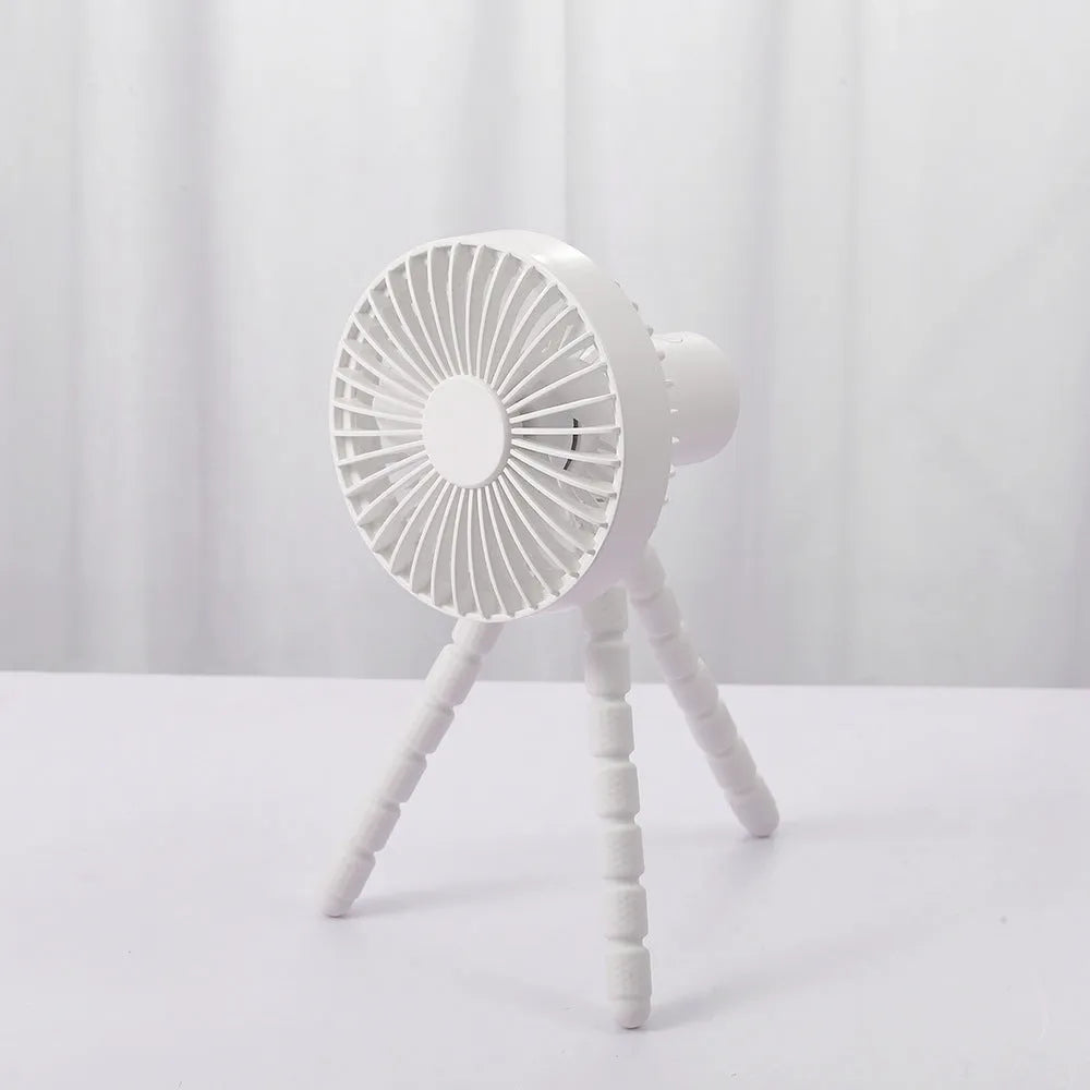 Small adjustable desktop fan with bending head on an octopus tripod, shown in black, green, pink, or white.