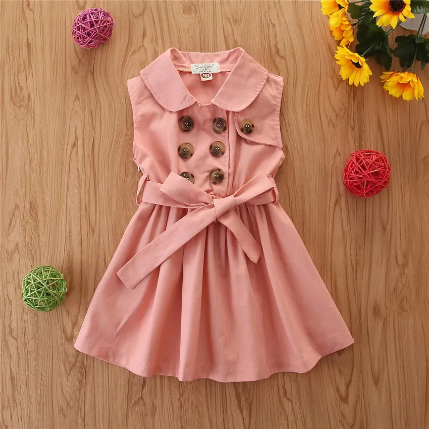 Sleeveless cotton A-line princess dress for a toddler girl in pink, with a front sash.