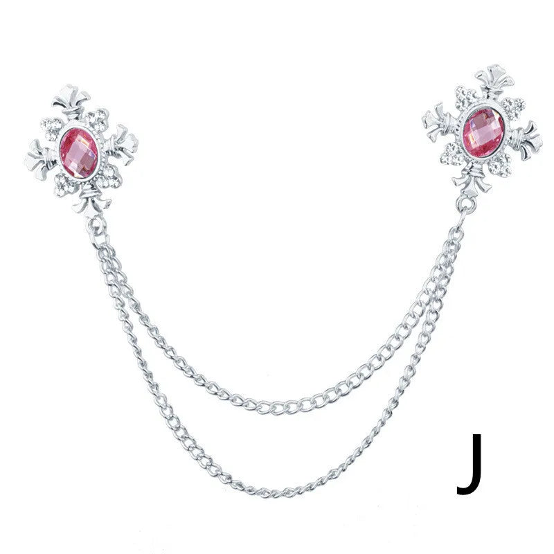 Fringed rhinestone cross collar pin in alloy with electroplated finish and inlaid rhinestones.