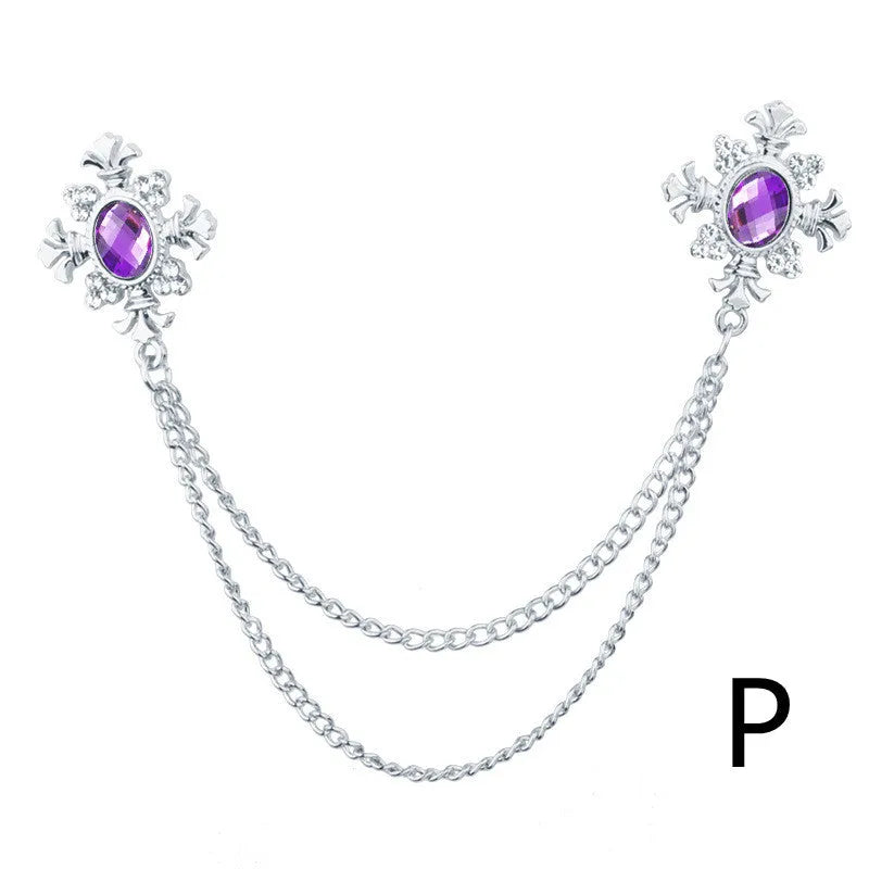 Fringed rhinestone cross collar pin in alloy with electroplated finish and inlaid rhinestones.