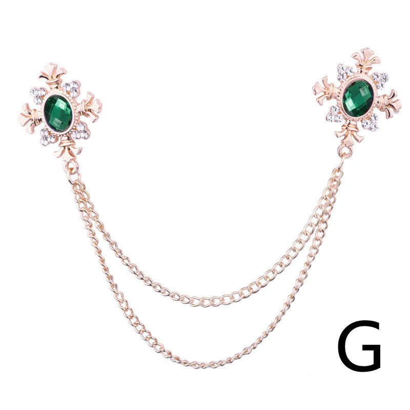 Fringed rhinestone cross collar pin in alloy with electroplated finish and inlaid rhinestones.