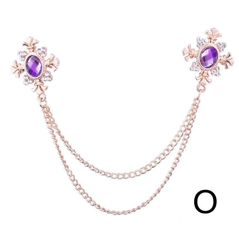 Fringed rhinestone cross collar pin in alloy with electroplated finish and inlaid rhinestones.
