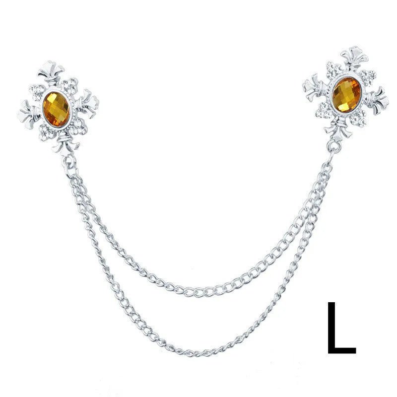 Fringed rhinestone cross collar pin in alloy with electroplated finish and inlaid rhinestones.