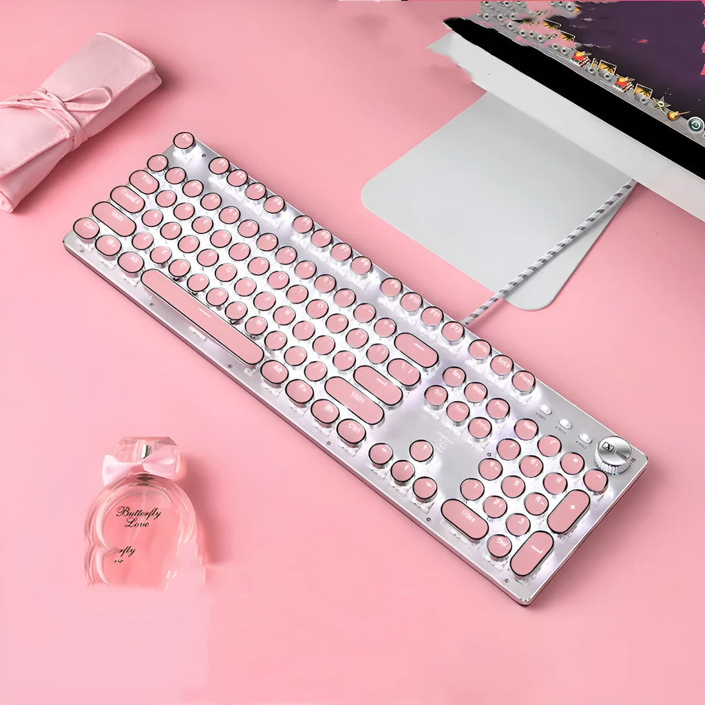 Queen Lipstick mechanical keyboard with pink keys, silver base, and white backlight.