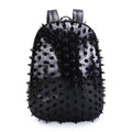 Black oval punk style women's backpack made of PU leather with air cushion straps and open pockets.