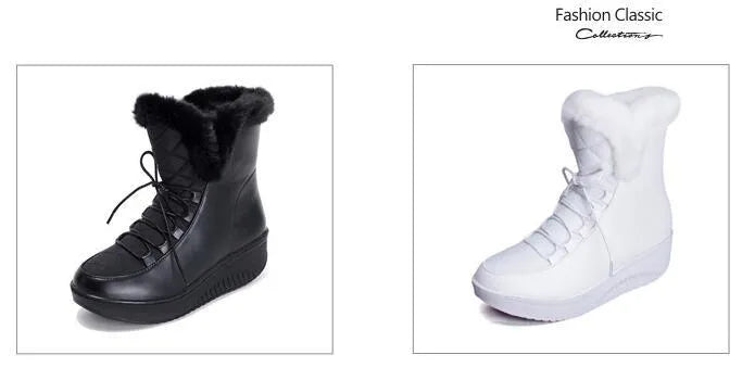 Women's black lace-up ankle boots with a platform sole on a wooden floor.