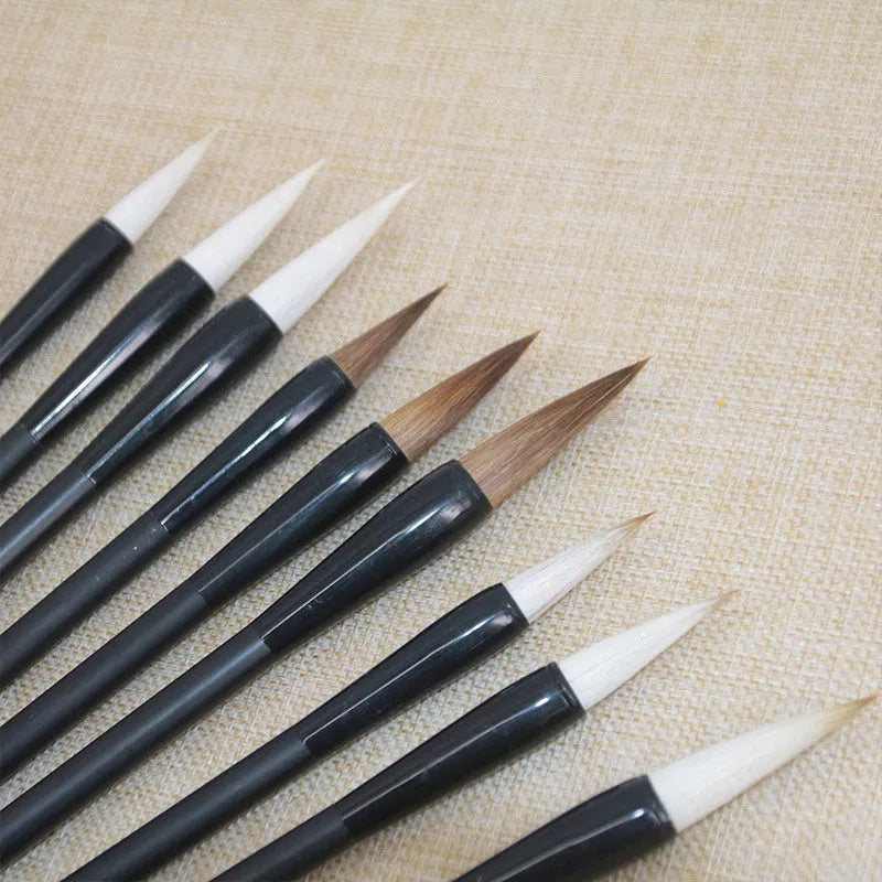 Traditional Chinese student writing brush with Jianhao nib on steel pipe barrel measuring 23cm length