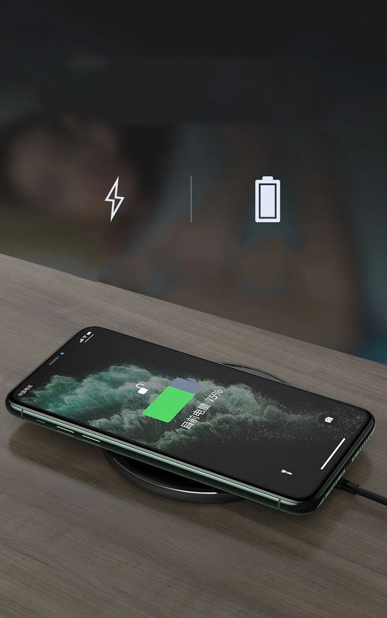 Black Kuulaa wireless disc phone charger with Micro USB cable