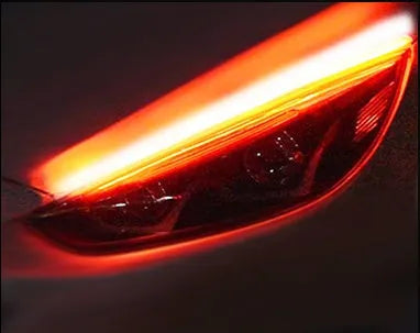 Silicone waterproof car LED strip for daytime running lights and flowing turn signals, showing wire connections.