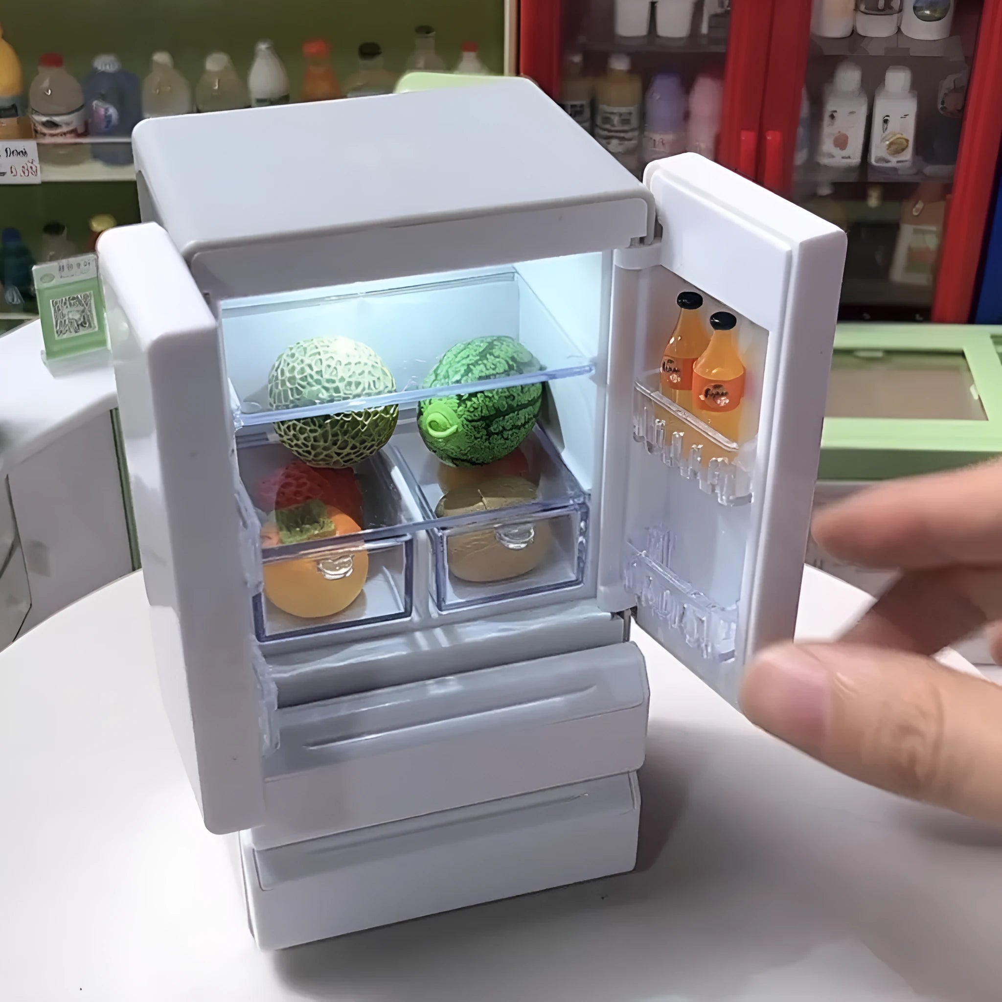 White plastic miniature candy toy model with LED light on, showing dimensions.