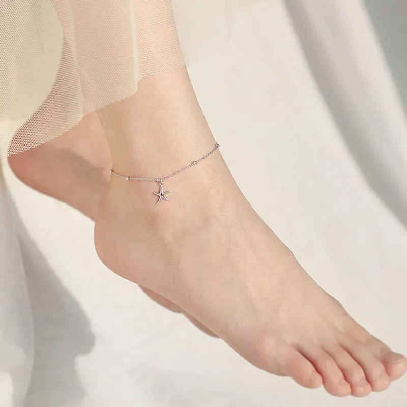 Women's sterling silver S925 anklet with a starfish charm and round beads chain.