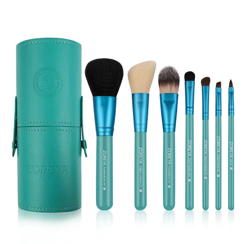 7-piece makeup brush set with synthetic and goat hair bristles and wood handles in green purple and red colours