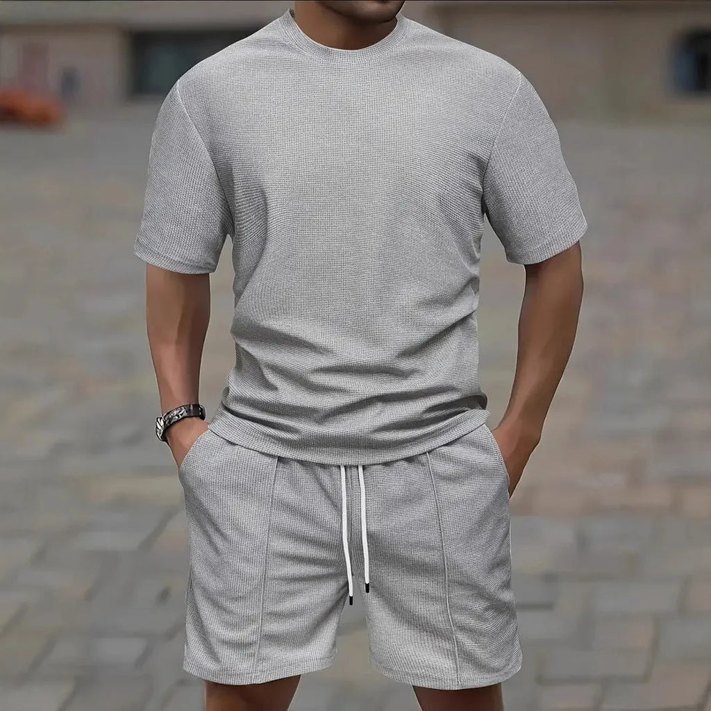 Men's apricot waffle texture short sleeve blouse and matching shorts laid flat.