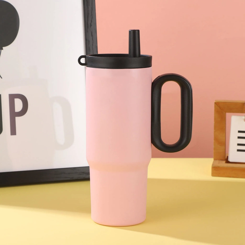 Insulated straw cup with handle showing 710ml capacity and leak-proof lid in assorted colours