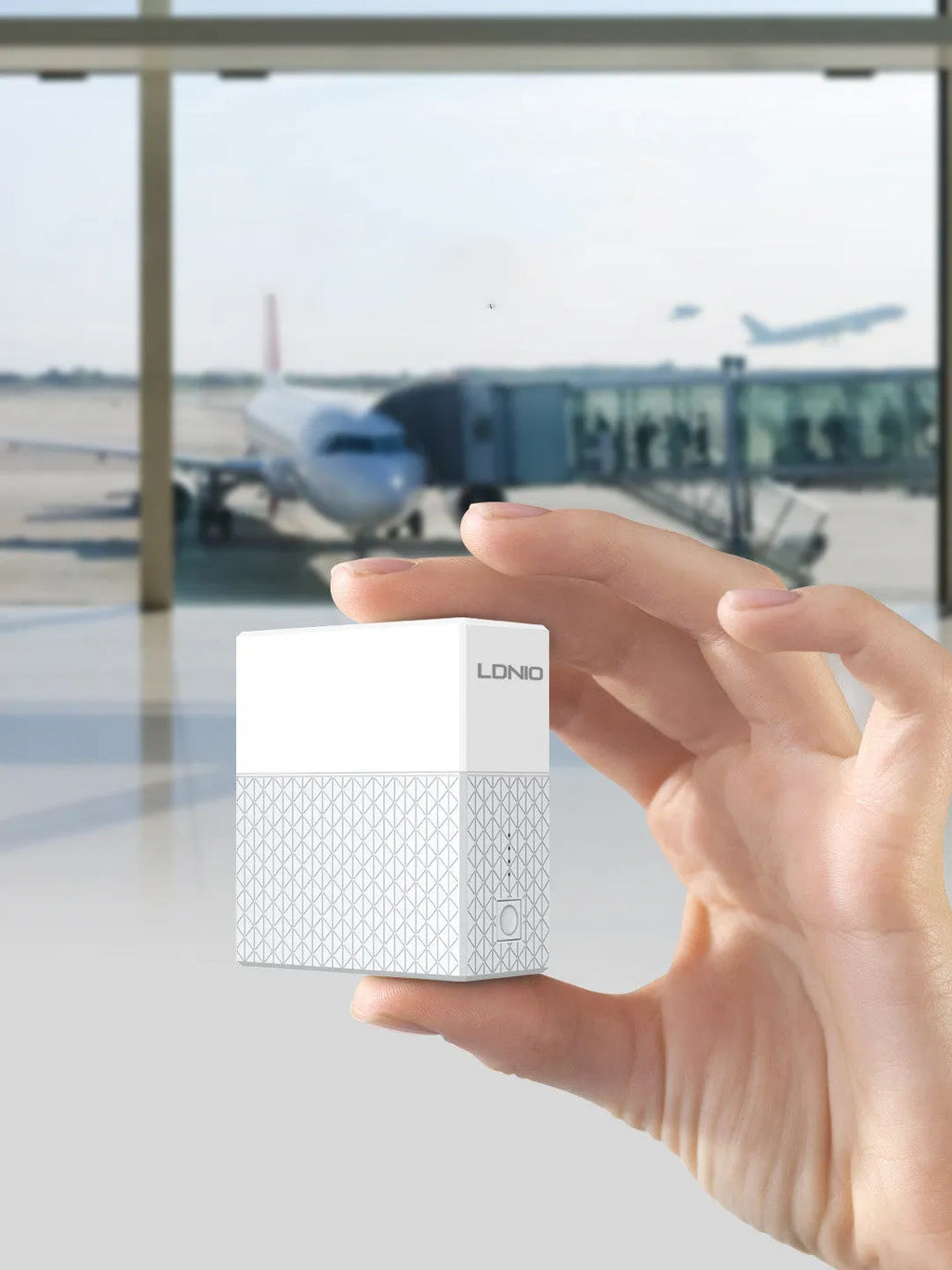White two-in-one mobile power bank charger with built-in plug measuring 71.5mm