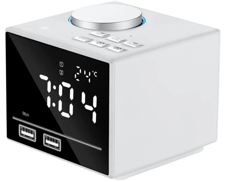 Bluetooth speaker alarm clock with colourful ambient light, LED mirror display, and dual USB ports on a nightstand