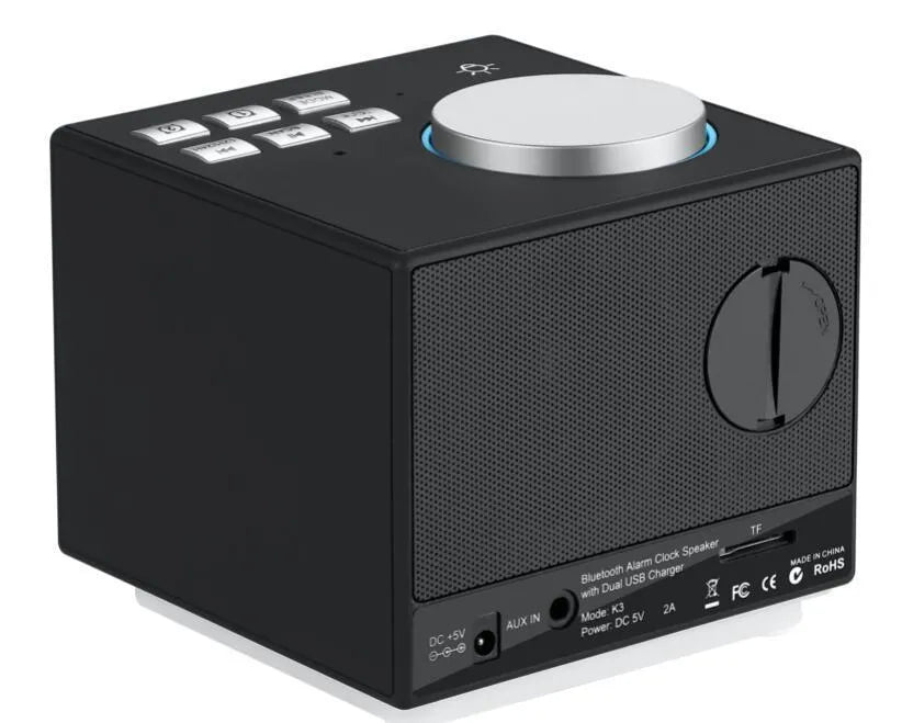 Bluetooth speaker alarm clock with colourful ambient light, LED mirror display, and dual USB ports on a nightstand