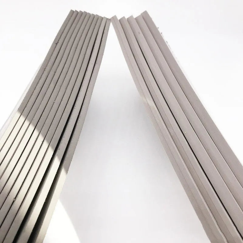 Black and grey plastic light-sensitive mat for seal pottery and calligraphy, showing 330mm by 110mm dimensions.