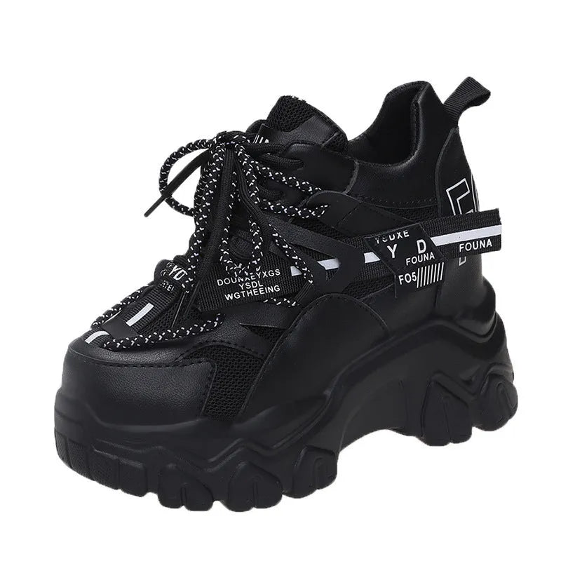 Women's white mesh platform sports shoes with a cross strap and rubber sole.