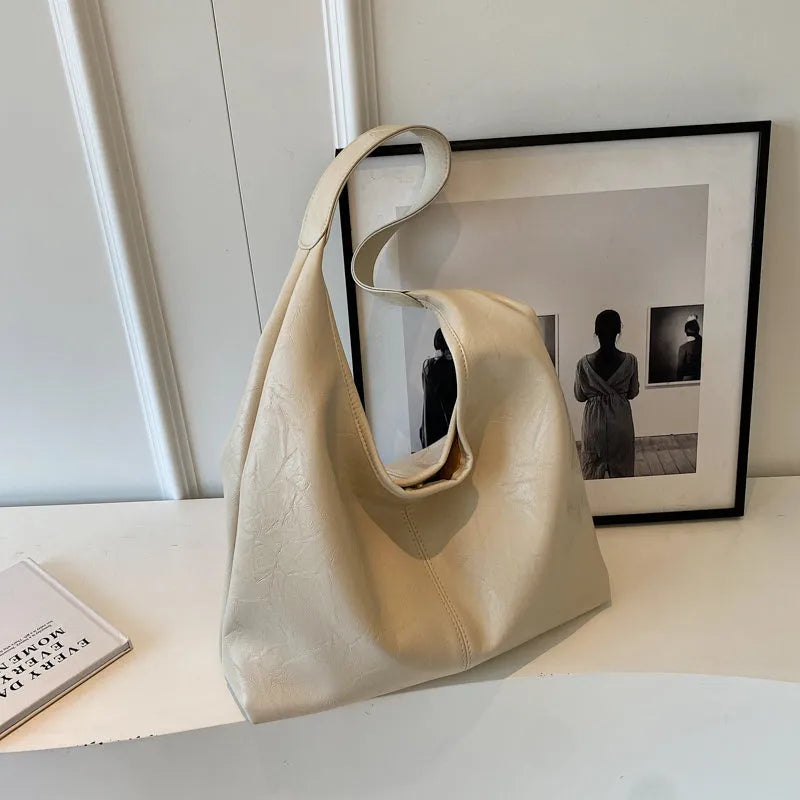 Casual soft leather shoulder bag in street trend style with large capacity and multiple colour options
