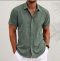 Men's light grey loose-fit cotton blend cardigan with a lapels collar and long sleeves laid flat.