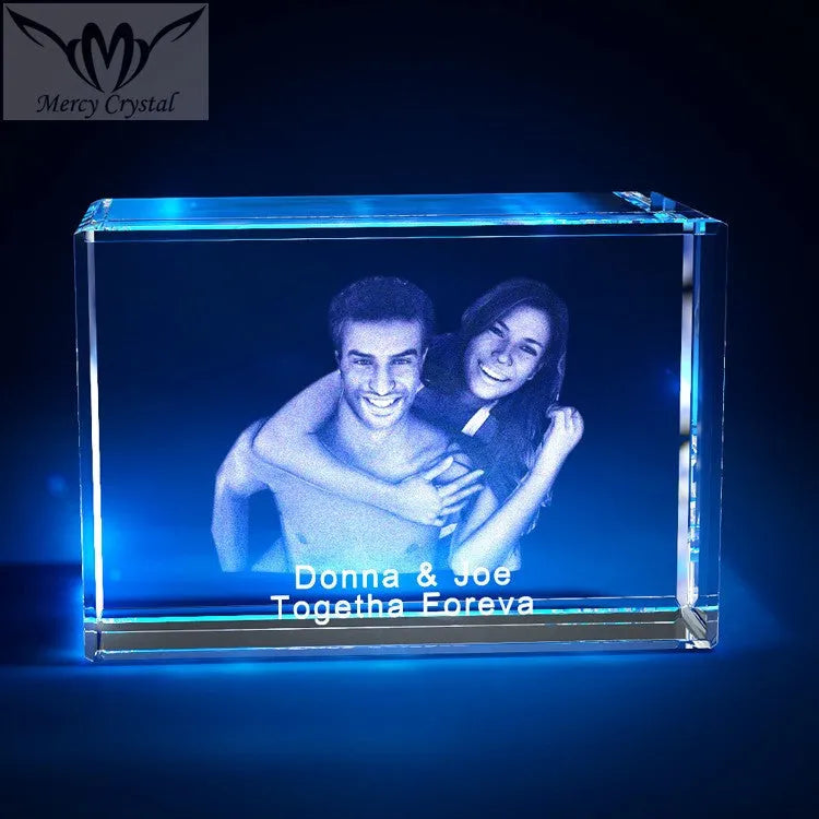 Custom laser engraved crystal sphere with personalised photo inside, available in multiple sizes and styles