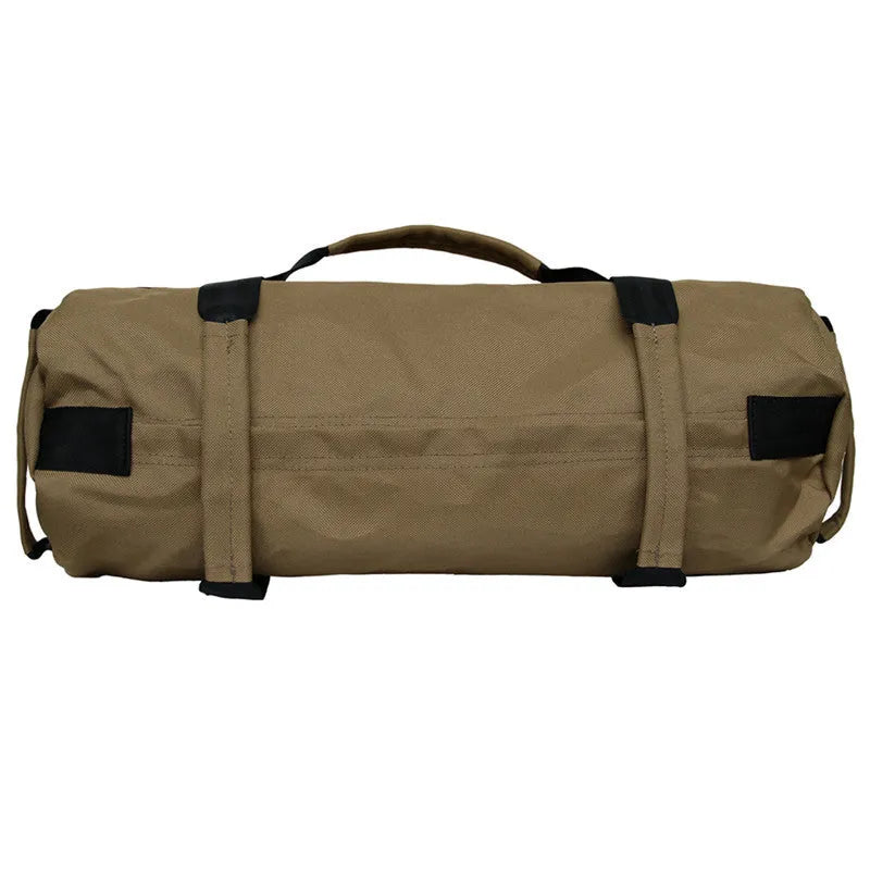 Black weightlifting sandbag with 6 handles, 900D Oxford cloth, 48cm, sitting on a gym floor.