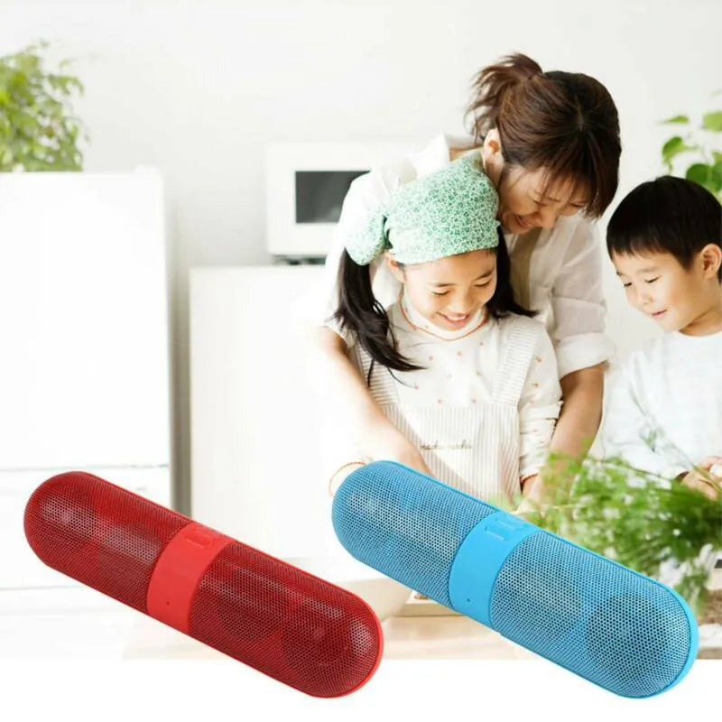 Portable pill Bluetooth audio speaker in blue with button controls and plastic shell