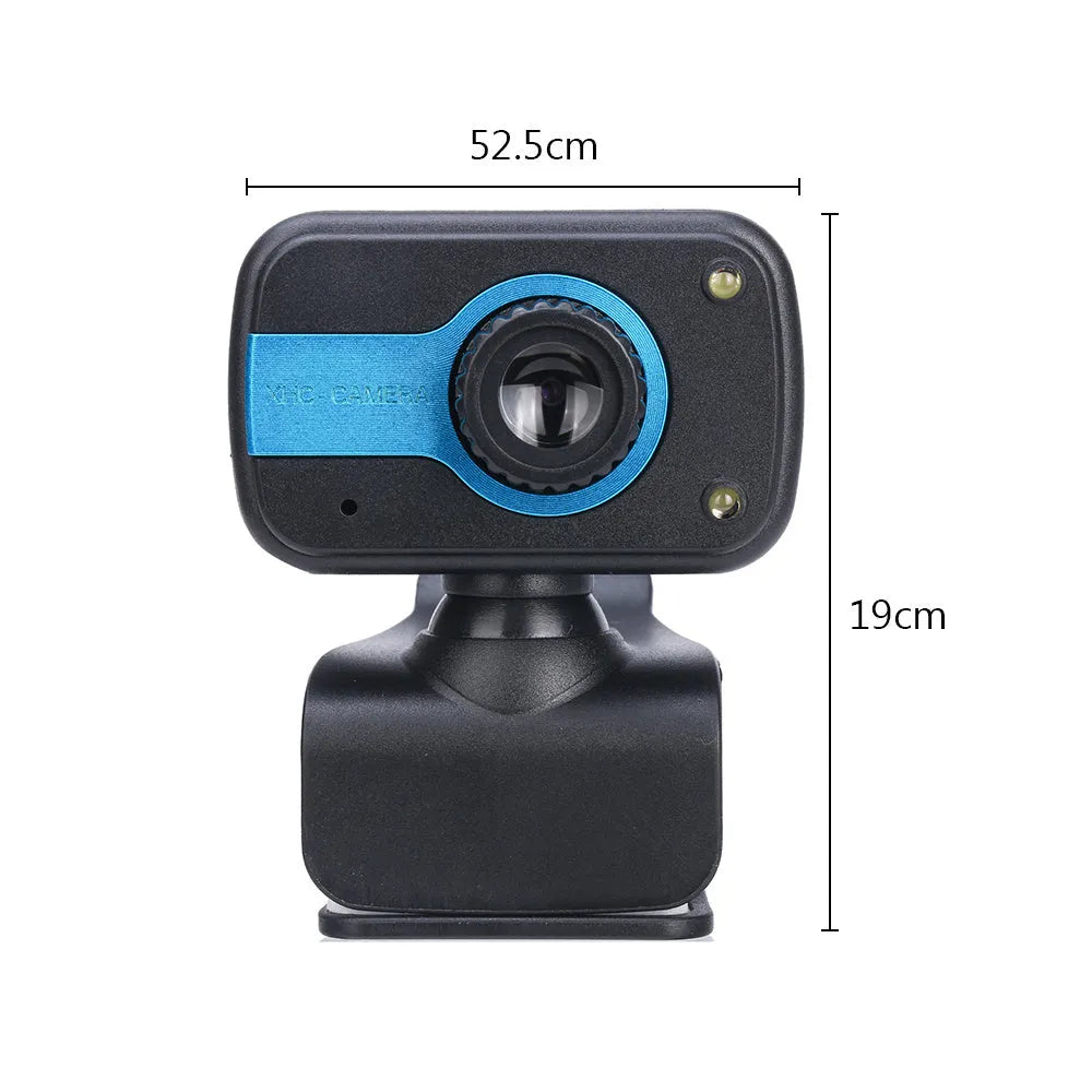 Blue mini USB webcam with a 360-degree rotating head on a desk next to a laptop.