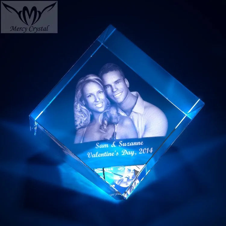 Custom laser engraved crystal sphere with personalised photo inside, available in multiple sizes and styles
